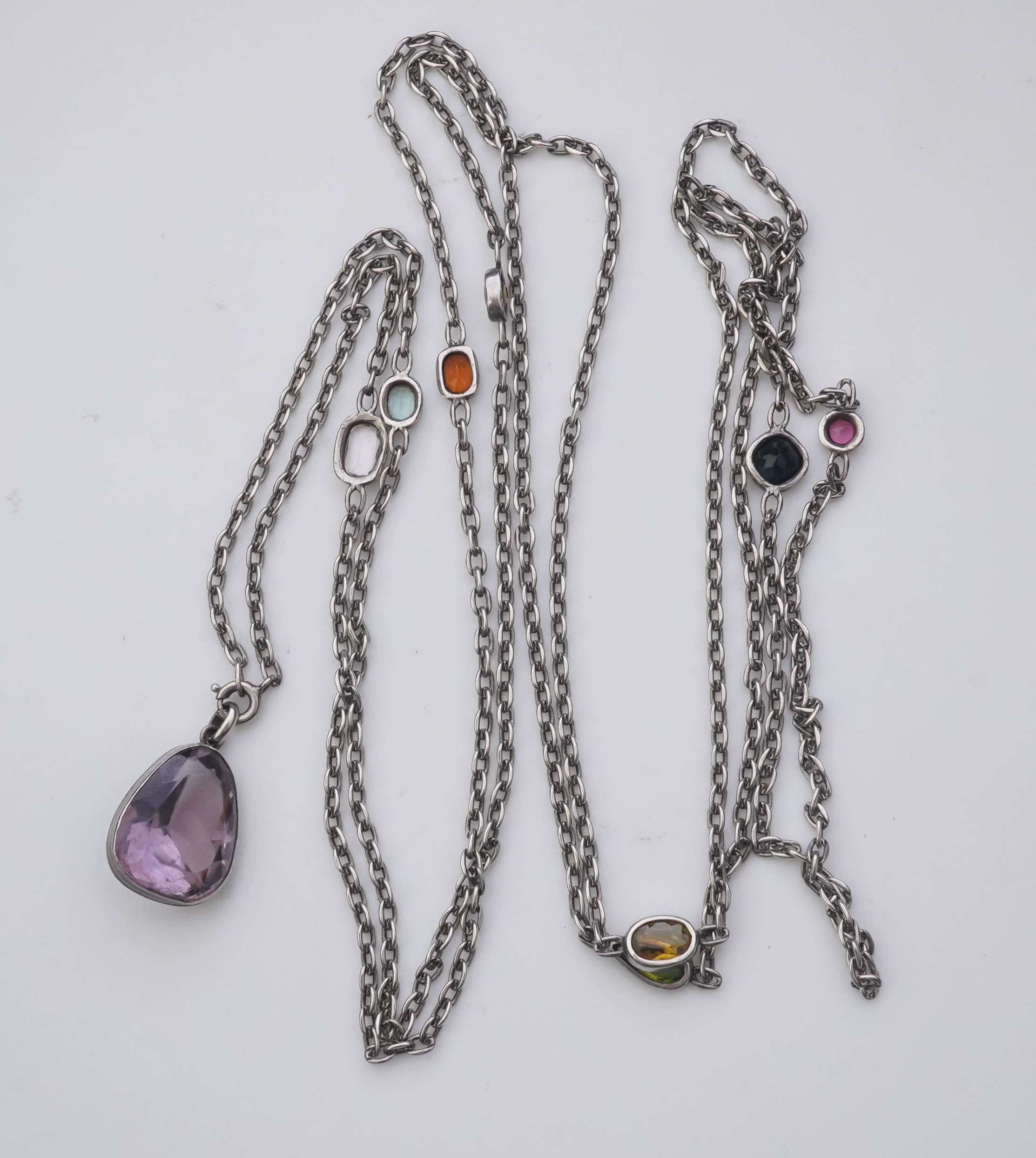 A collection of silver and gem-set jewellery